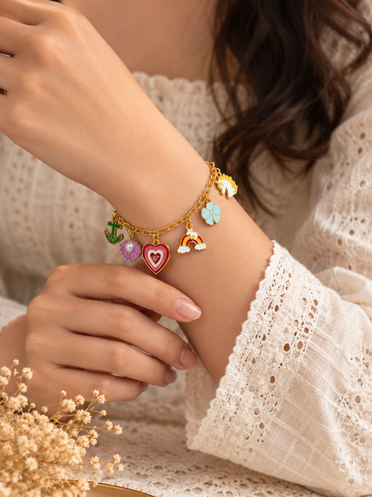 Colorful charm bracelet with gold-tone chain and cute enamel charms