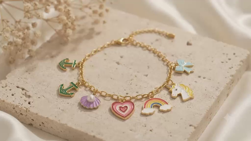 Colorful charm bracelet with gold-tone chain and cute enamel charms